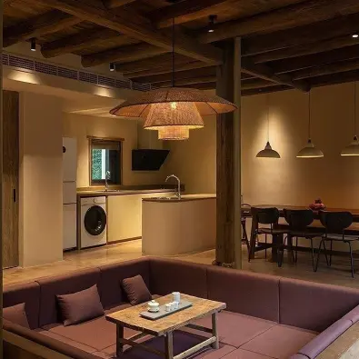 Minimalist Kyoto rattan pendant in a Japandi living room.