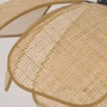 Close up detail of handwoven rattan petals on Lotus Bloom pendant.