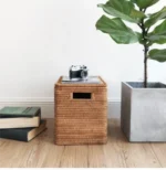 Minimalist woven storage bin adding warmth to a neutral room.