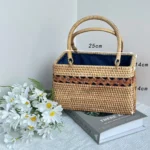 Handcrafted rattan bag hanging on a wall for natural texture.