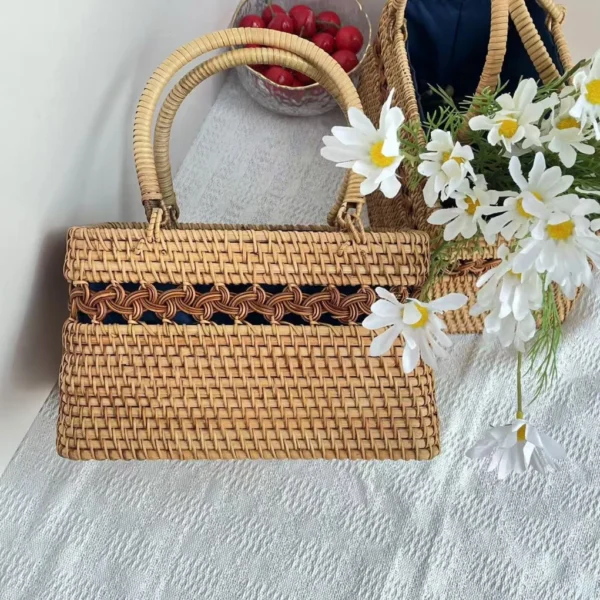 Rattan market tote used as a decorative flower basket holder.