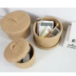 Round rattan basket used as a stylish indoor plant pot cover.